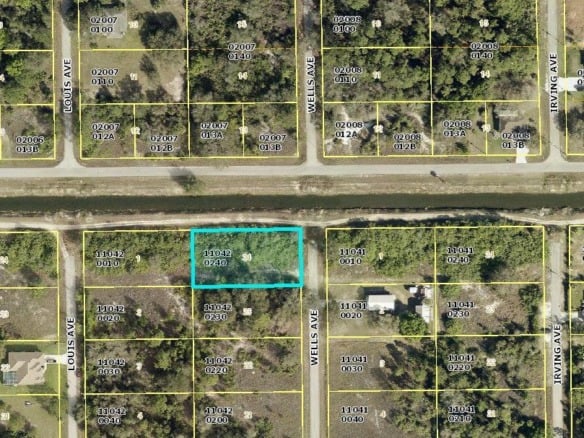 1923 Wells Avenue, Lehigh Acres FL 33972 — #R11004333