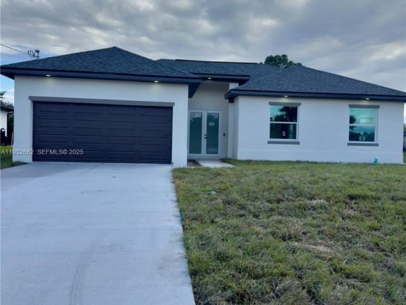 748 748 CHESTNUT ST E, Lehigh Acres FL 33974 — #A11932662