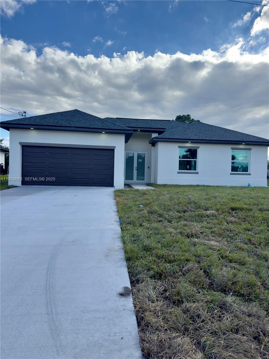 748 748 CHESTNUT ST E, Lehigh Acres FL 33974 — #A11932662