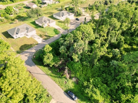 953 Lytle St E, Lehigh Acres FL 33974 — #A11828116