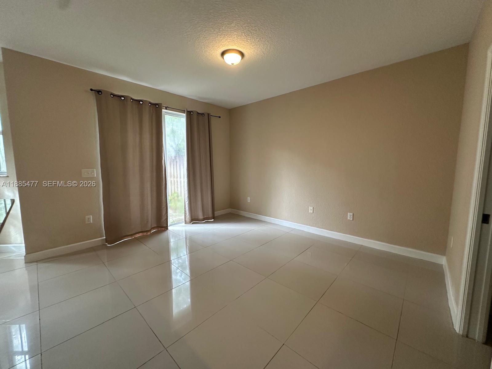 6dd28e9b-2167 1026 NE 207th Ter # 1026, Miami FL 33179 — #A11885477