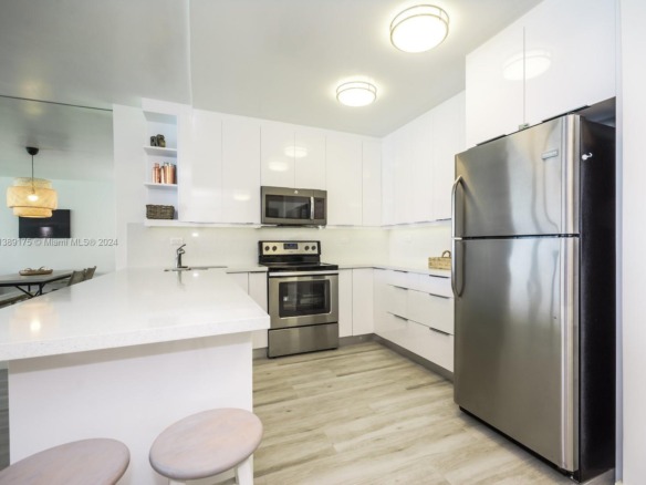 5601 Collins Ave # 1204, Miami Beach FL 33140 — #A11389175
