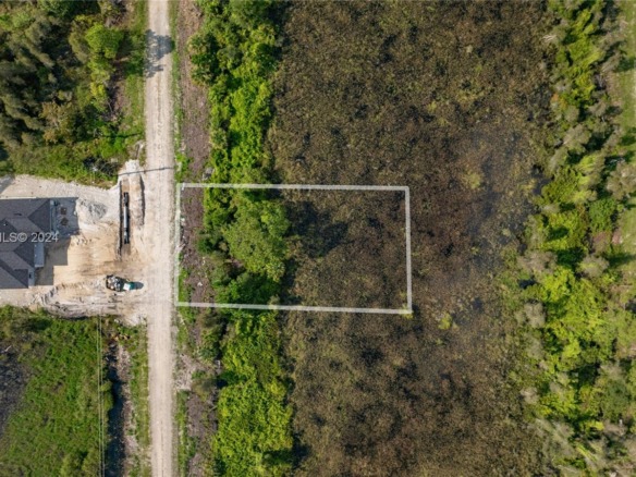 853 Belden Ave, Lehigh Acres FL 33936 — #A11494363