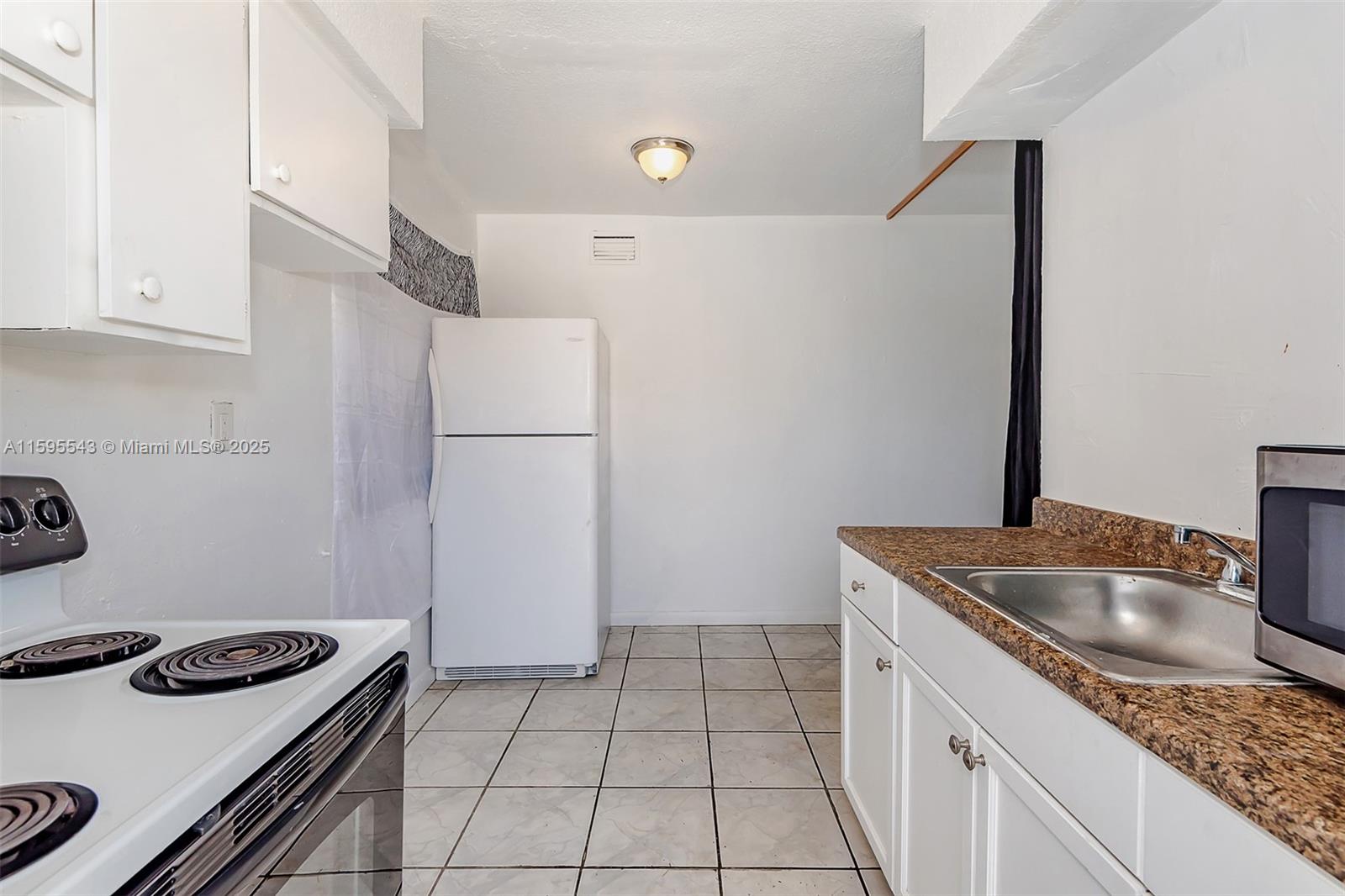 6dd28e9b-3105 5600 NW 7th Ct # 14, Miami FL 33127 — #A11595543