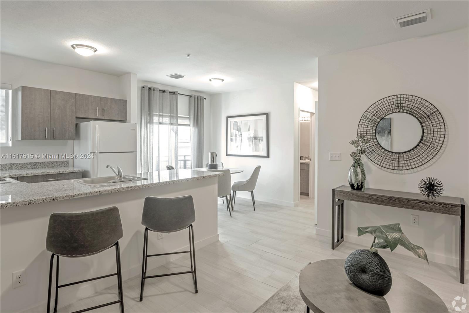 6dd28e9b-3213 243 W 77th St # 102, Hialeah FL 33014 — #A11617615