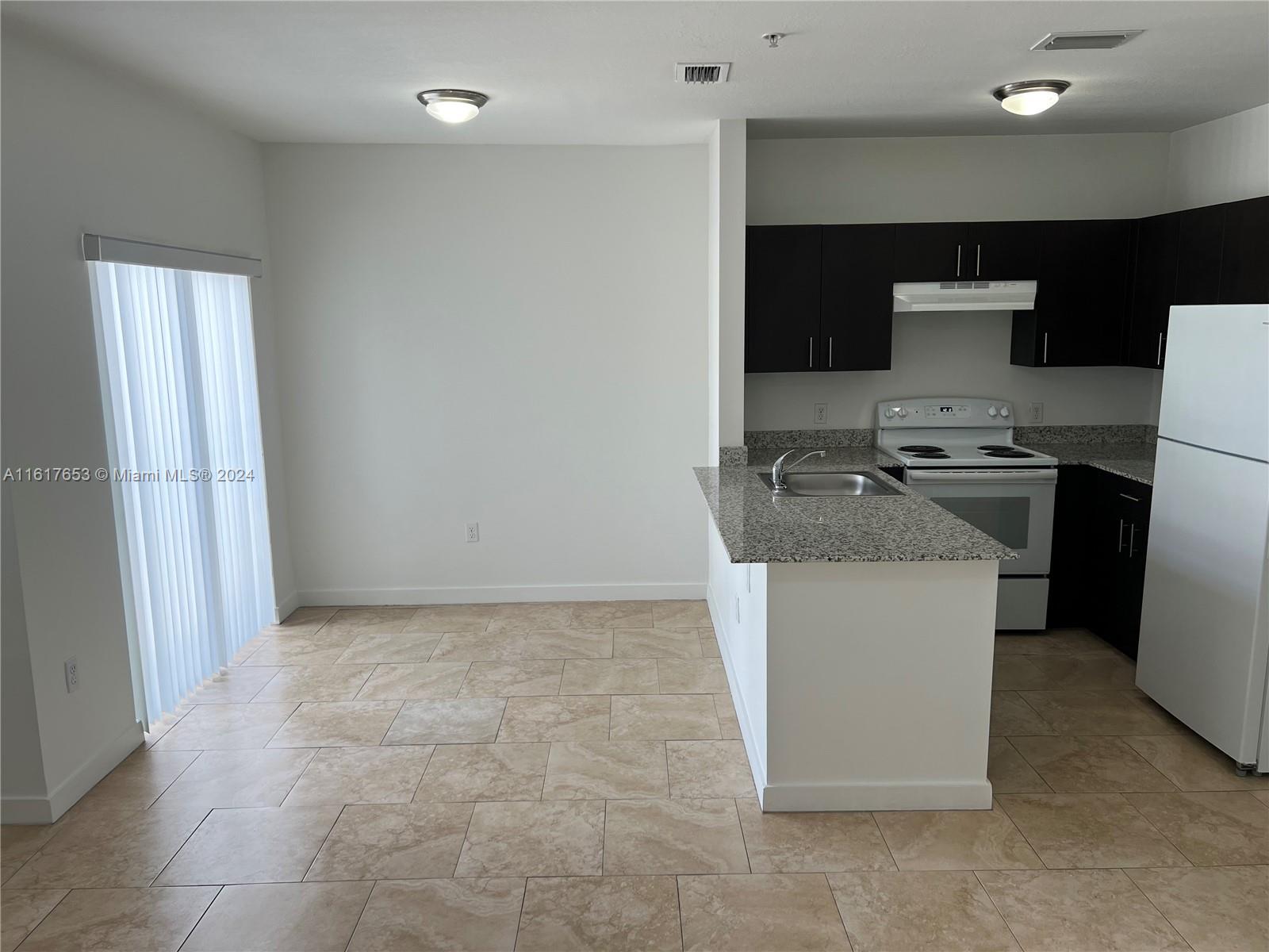 7945 W 2nd Ct # 102, Hialeah FL 33014 — #A11617653