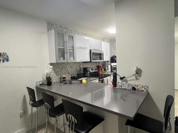 8075 NW 7th St # 109, Miami FL 33126 — #A11669745