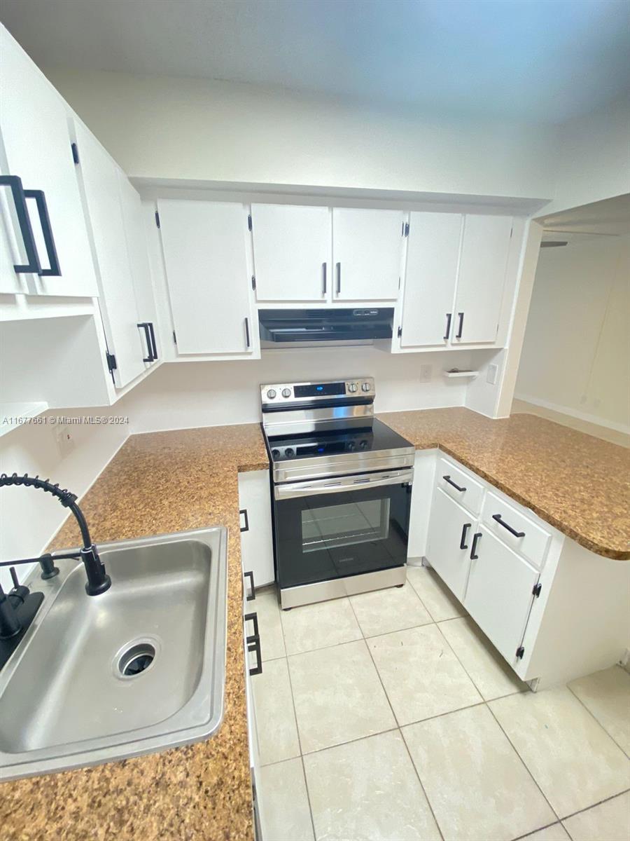 2029 NW 46th Ave # E308, Lauderhill FL 33313 — #A11677661
