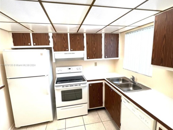 6570 Royal Palm Blvd # 107J, Margate FL 33063 — #A11678135