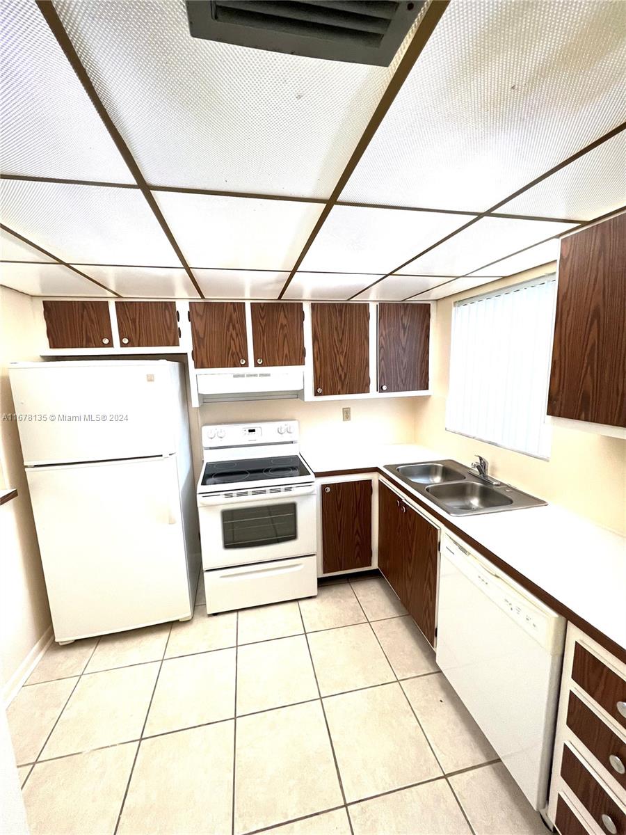6dd28e9b-3548 6570 Royal Palm Blvd # 107J, Margate FL 33063 — #A11678135