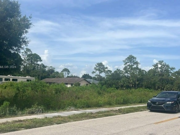 805 E 6 st, Lehigh Acres FL 33972 — #A11685362