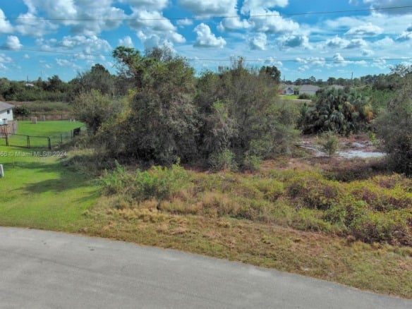 309 Raber Ave, Lehigh Acres FL 33974 — #A11713666
