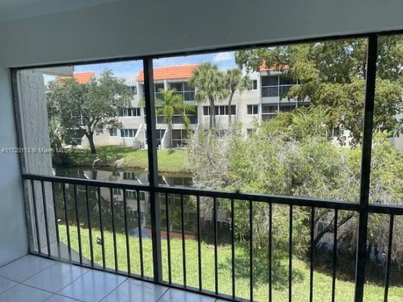 301 Racquet Club Rd # 201, Weston FL 33326 — #A11720113