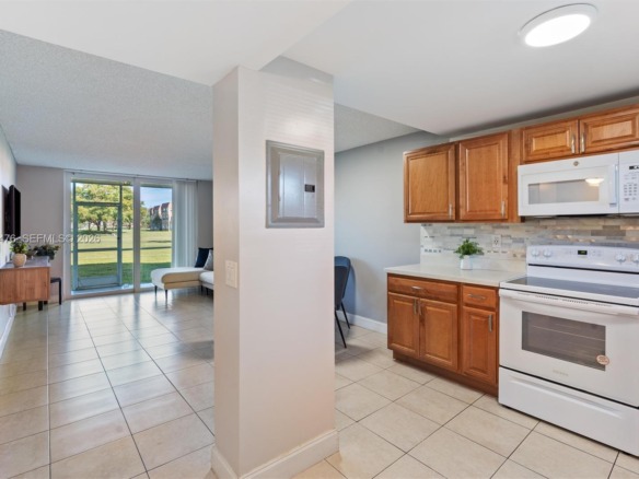 9761 Sunrise Lakes Blvd # 107, Sunrise FL 33322 — #A11739476