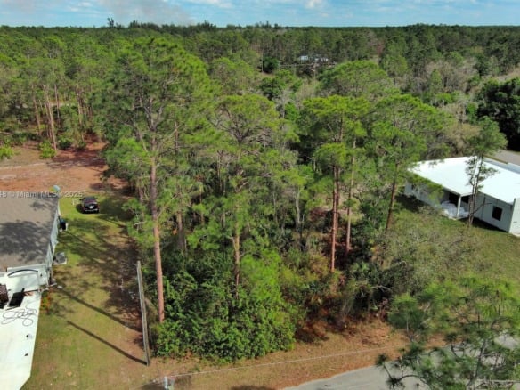 1702 Greenwood Ave, Lehigh Acres FL 33972 — #A11755748