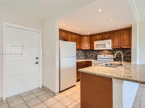 1855 Plunkett St # 406, Hollywood FL 33020 — #A11760125