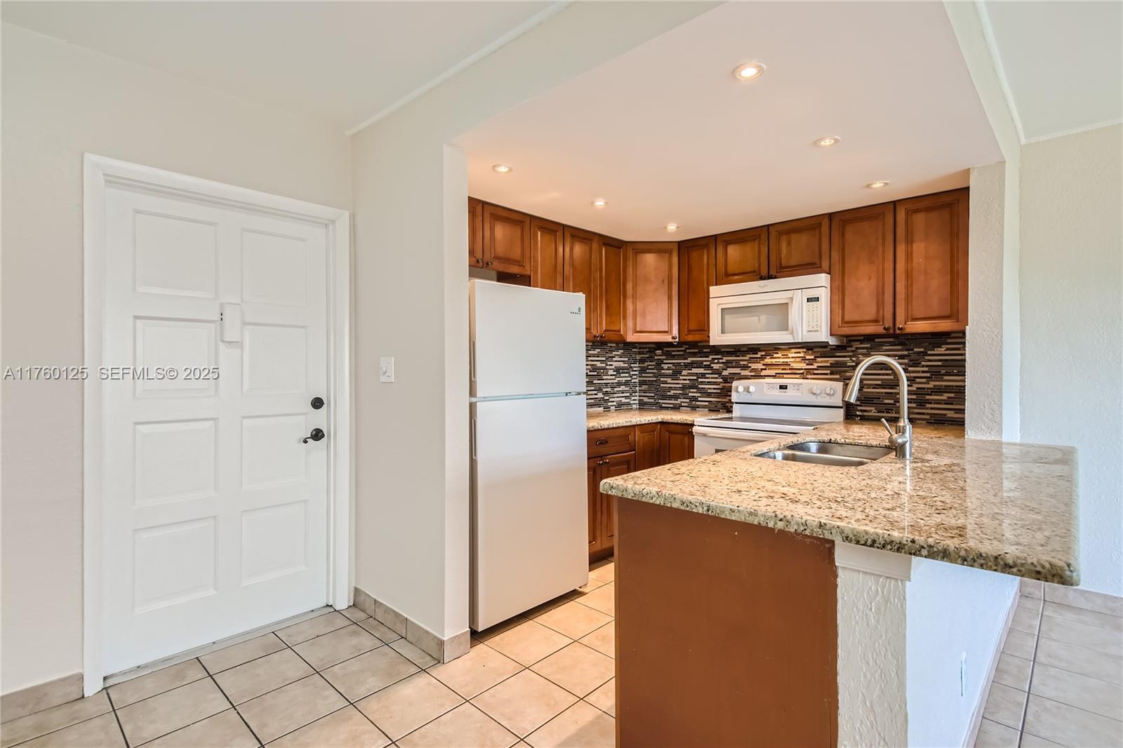 1855 Plunkett St # 406, Hollywood FL 33020 — #A11760125