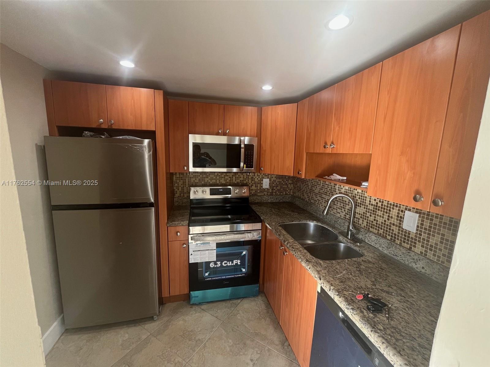 498 NW 165th St # 501, Miami FL 33169 — #A11762554