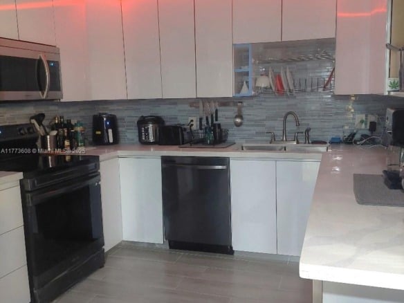 16300 Golf Club Rd Apt 317, Weston FL 33326 — #A11773608