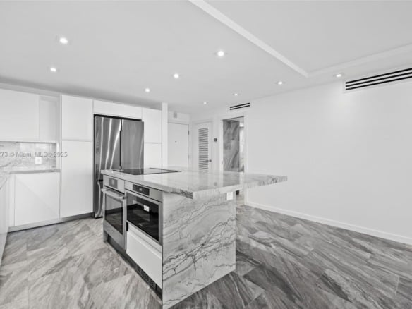 1658 Bay Rd # 504, Miami Beach FL 33139 — #A11778273
