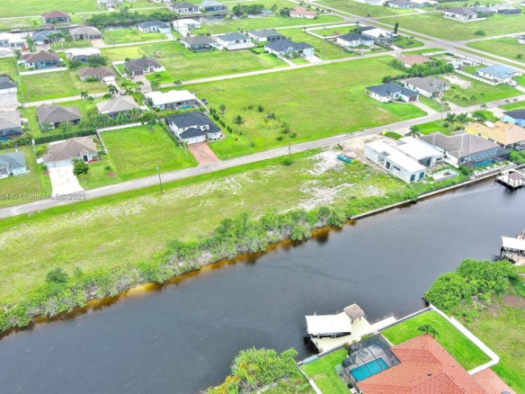 1228 NW 34th Ave, Cape Coral FL 33993 — #A11851264
