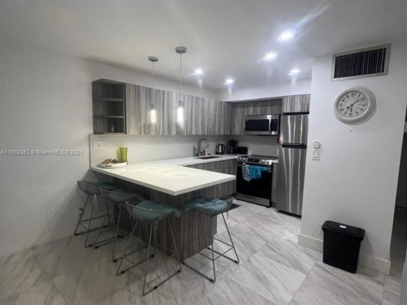 2145 Pierce St # 422, Hollywood FL 33020 — #A11808362