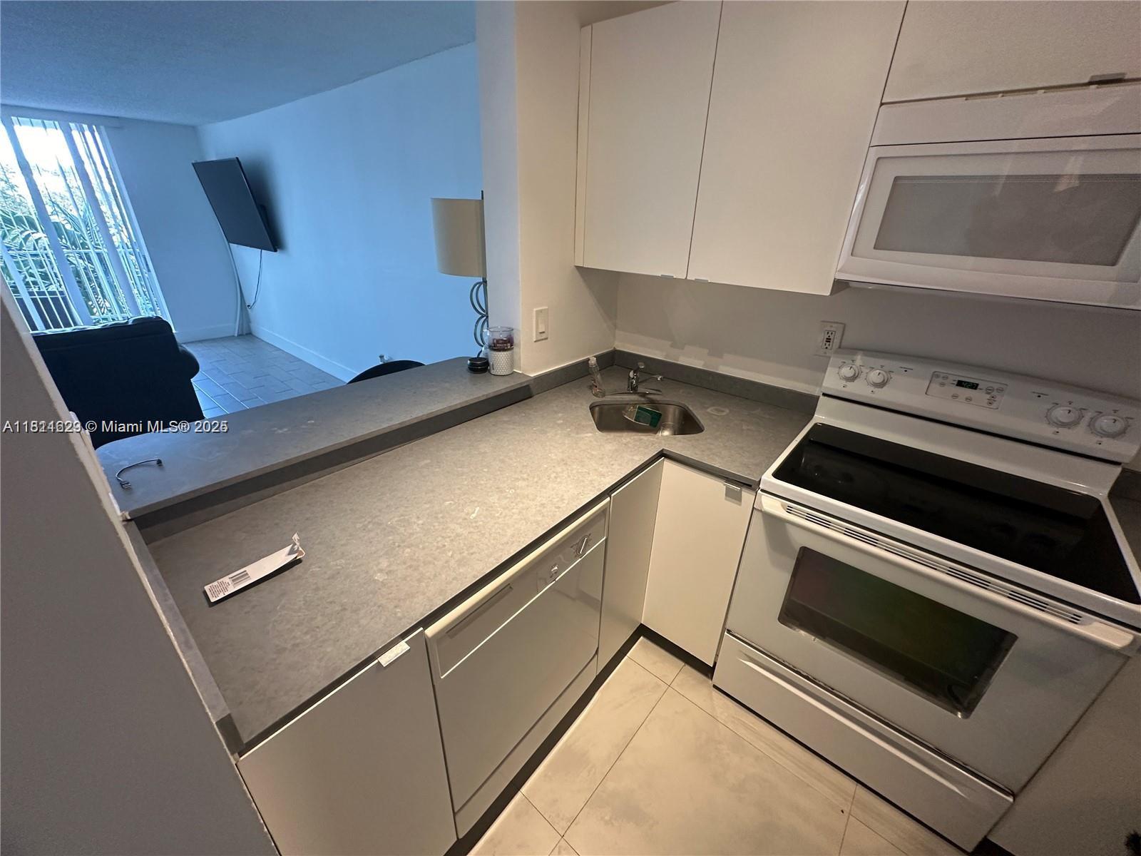 6dd28e9b-5451 486 NW 165th St Rd # 303, Miami FL 33169 — #A11811629