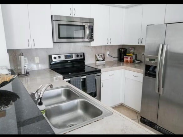19601 E Country Club Drive # 203, Aventura FL 33180 — #A11815540