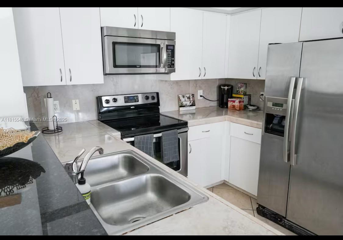 6dd28e9b-5528 19601 E Country Club Drive # 203, Aventura FL 33180 — #A11815540