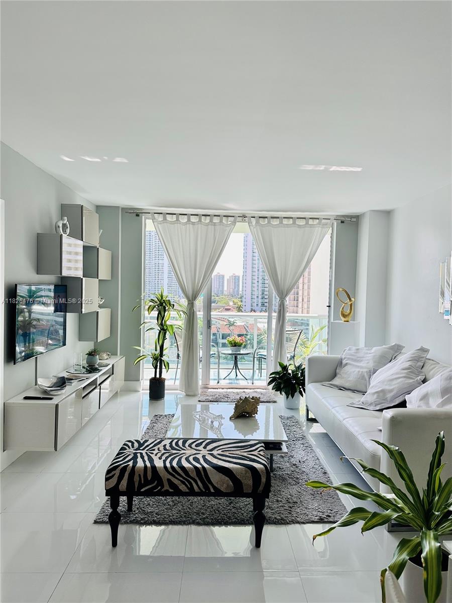 19390 Collins Ave # 911, Sunny Isles Beach FL 33160 — #A11826476