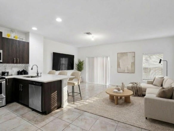 1128 NW 40th Ter, Lauderhill FL 33313 — #A11829736