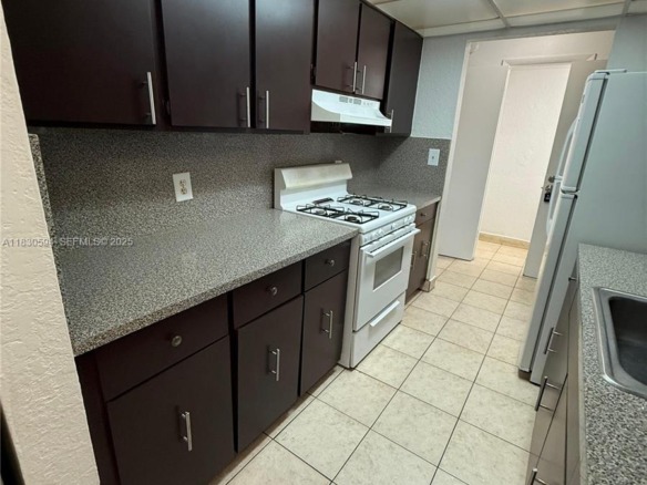 1305 W 53rd St # 406, Hialeah FL 33012 — #A11830594