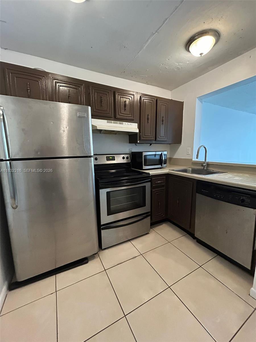 496 NW 165th St Rd # 310, Miami FL 33169 — #A11832216