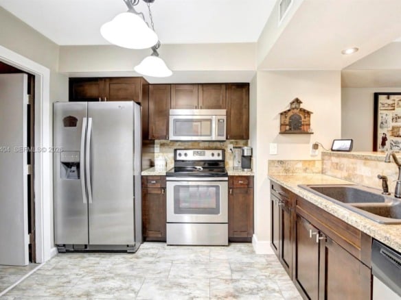9715 NW 23rd Ct, Pembroke Pines FL 33024 — #A11838404