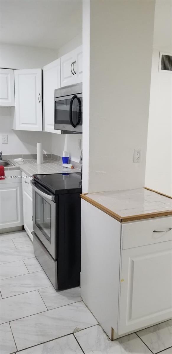 6dd28e9b-6204 8701 SW 141st St # M2, Palmetto Bay FL 33176 — #A11840939