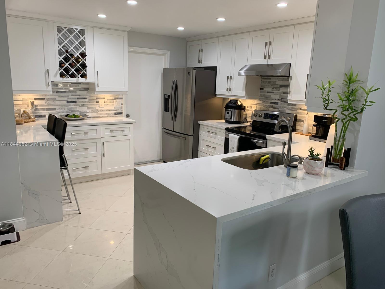 1051 Sorrento Dr, Weston FL 33326 — #A11844052