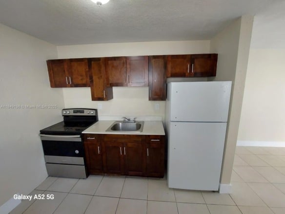 1574 NW 58th St, Miami FL 33142 — #A11849198
