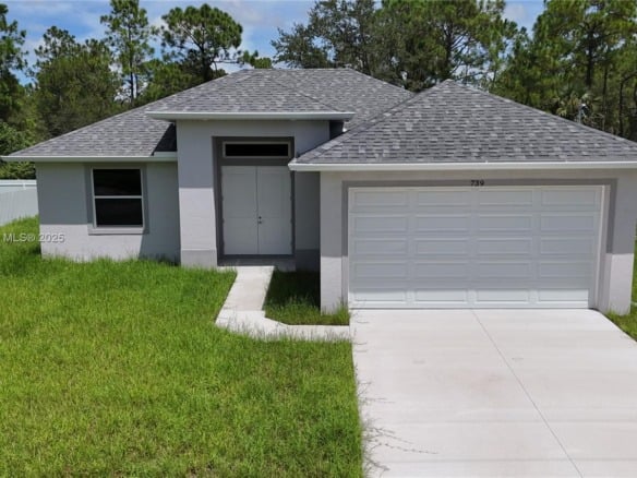 739 Sunrise Blvd, Lehigh Acres FL 33974 — #A11852668