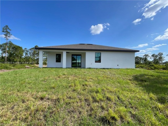 1137 Damen ST E, Lehigh Acres FL 33974 — #A11855005
