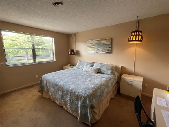 4975 E Sabal Palm Blvd # 208, Tamarac FL 33319 — #A11855862