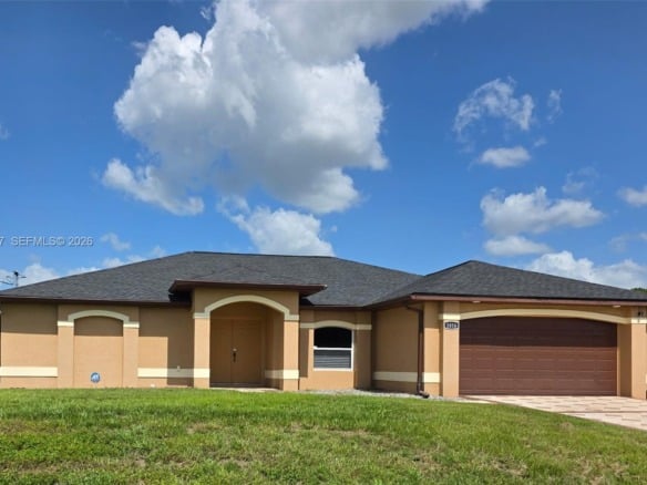 1816 Tomaso Ave, Lehigh Acres FL 33972 — #A11858147