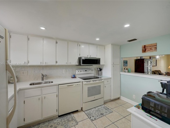 3186 Via Poinciana # 203, Lake Worth FL 33467 — #A11858206