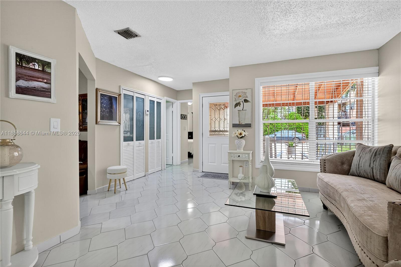 6570 W 2nd Ct # 19C, Hialeah FL 33012 — #A11858644