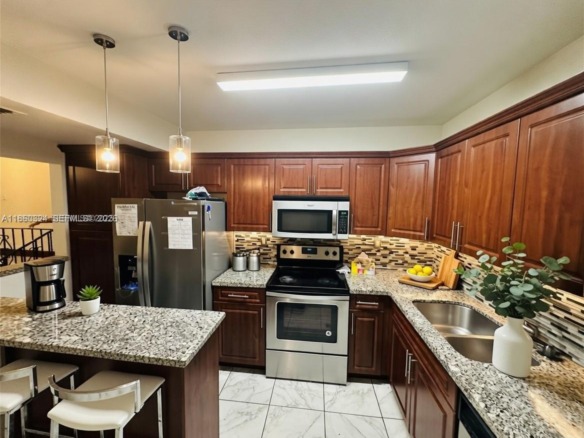 4850 SW 63rd Ter # 323, Davie FL 33314 — #A11860324