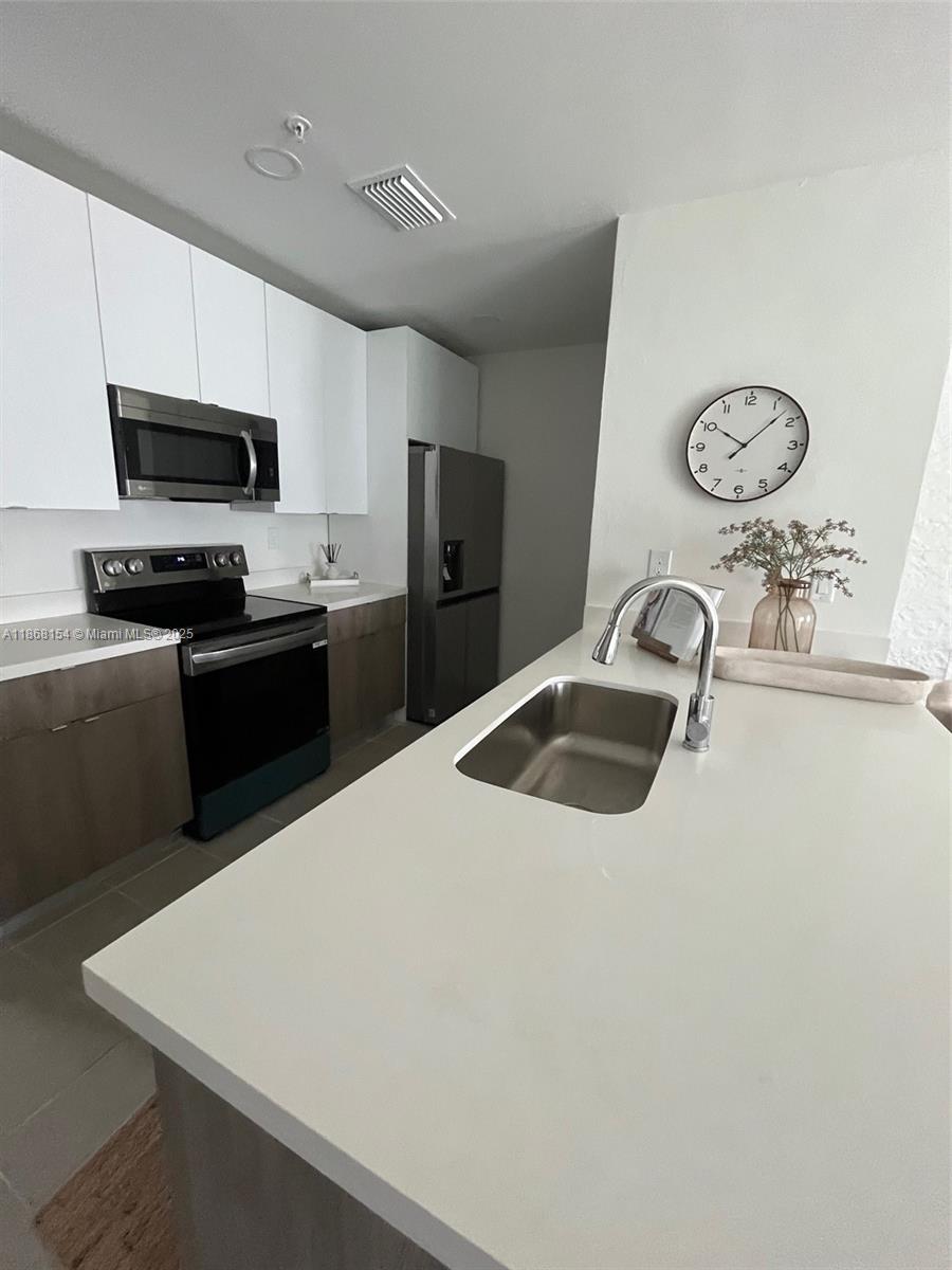 2526 Pierce Street # 12, Hollywood FL 33020 — #A11868154