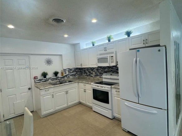 4808 NW 27th Ter, Tamarac FL 33309 — #A11870974