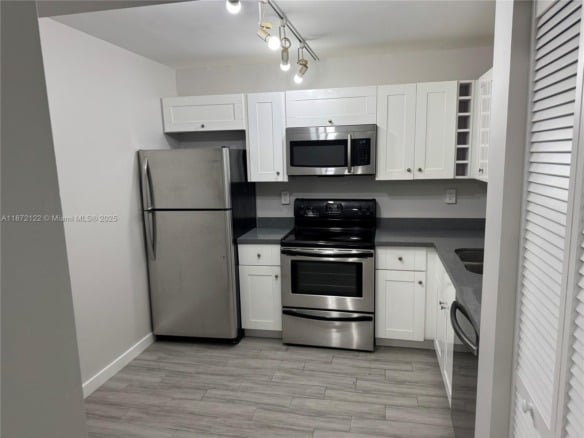 721 N Pine Island Rd # 201, Plantation FL 33324 — #A11872122