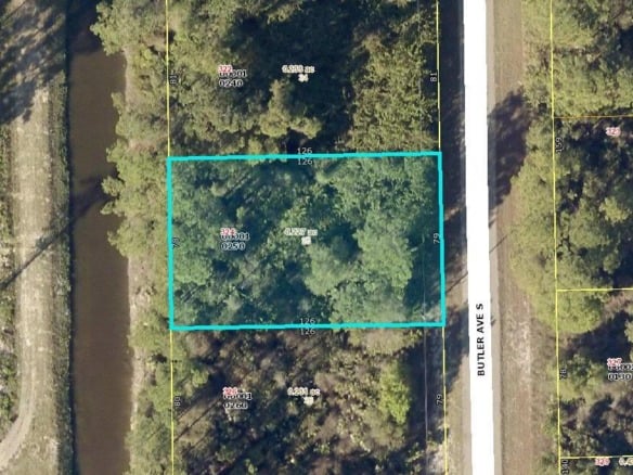 324 Butler Avenue S, Lehigh Acres FL 33974 — #R10832841