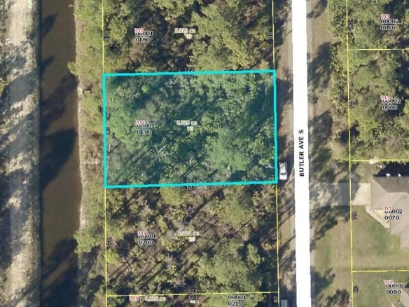 312 Butler Avenue S, Lehigh Acres FL 33974 — #R10832833