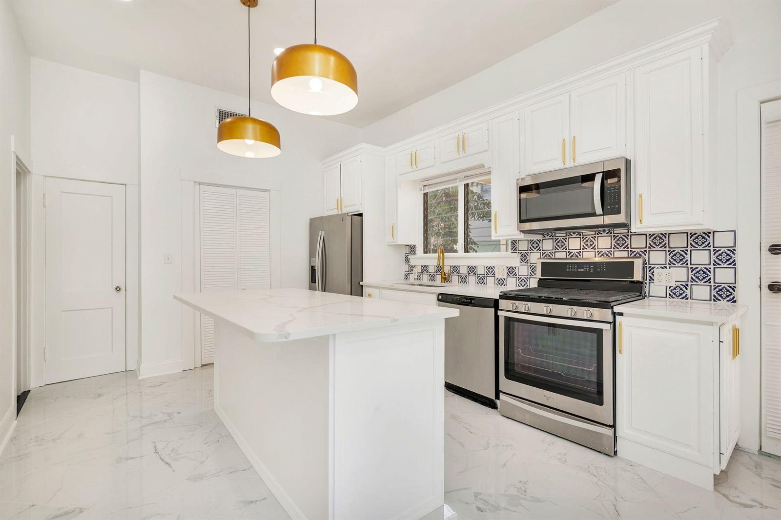 232 Rugby Road, West Palm Beach FL 33405 — #R10948134